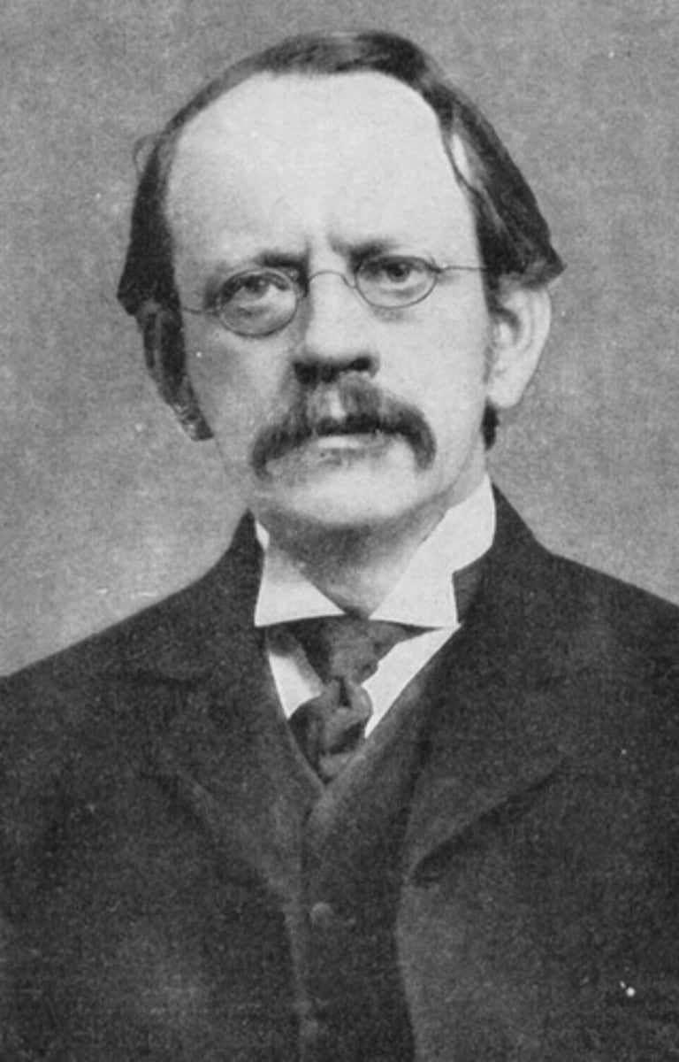 <p>1897; finds the electron of an atom using a cathode ray tube; also said the electron must be balanced by positive charge; proposed the plum pudding model.</p>