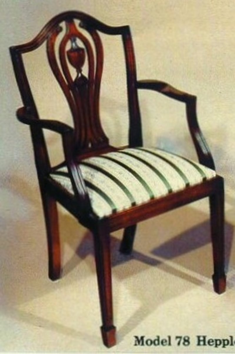 <p>Hepplewhite chair with a curved top rail reminiscent of a camel hump.</p>