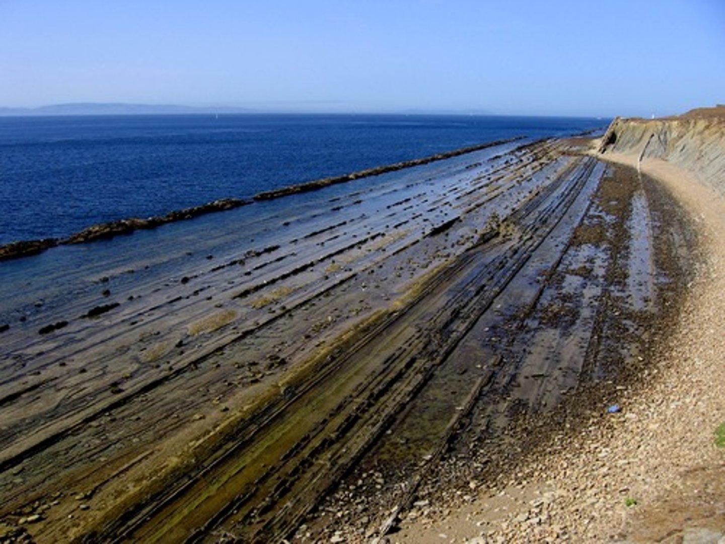 <p>When a glacier scratches the surface of the land it goes over.</p>