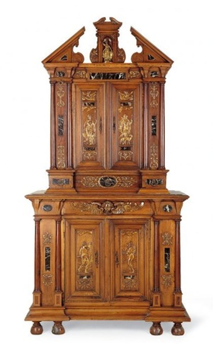<p>Originally large cabinet or wardrobe used for storing clothes, often converted into entertainment or computer center</p>