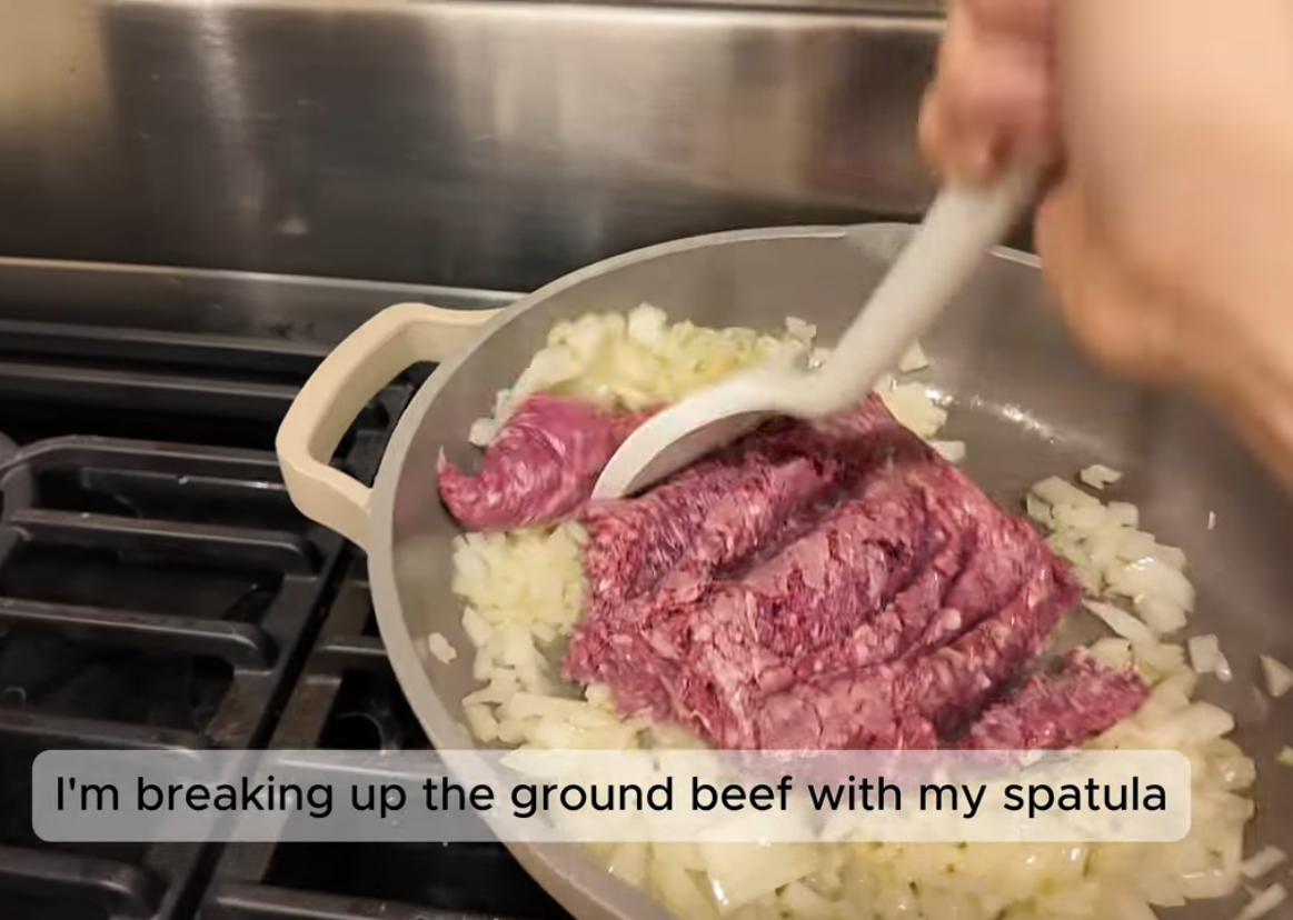 <p>I am breaking up the ground beef with my spatula</p>