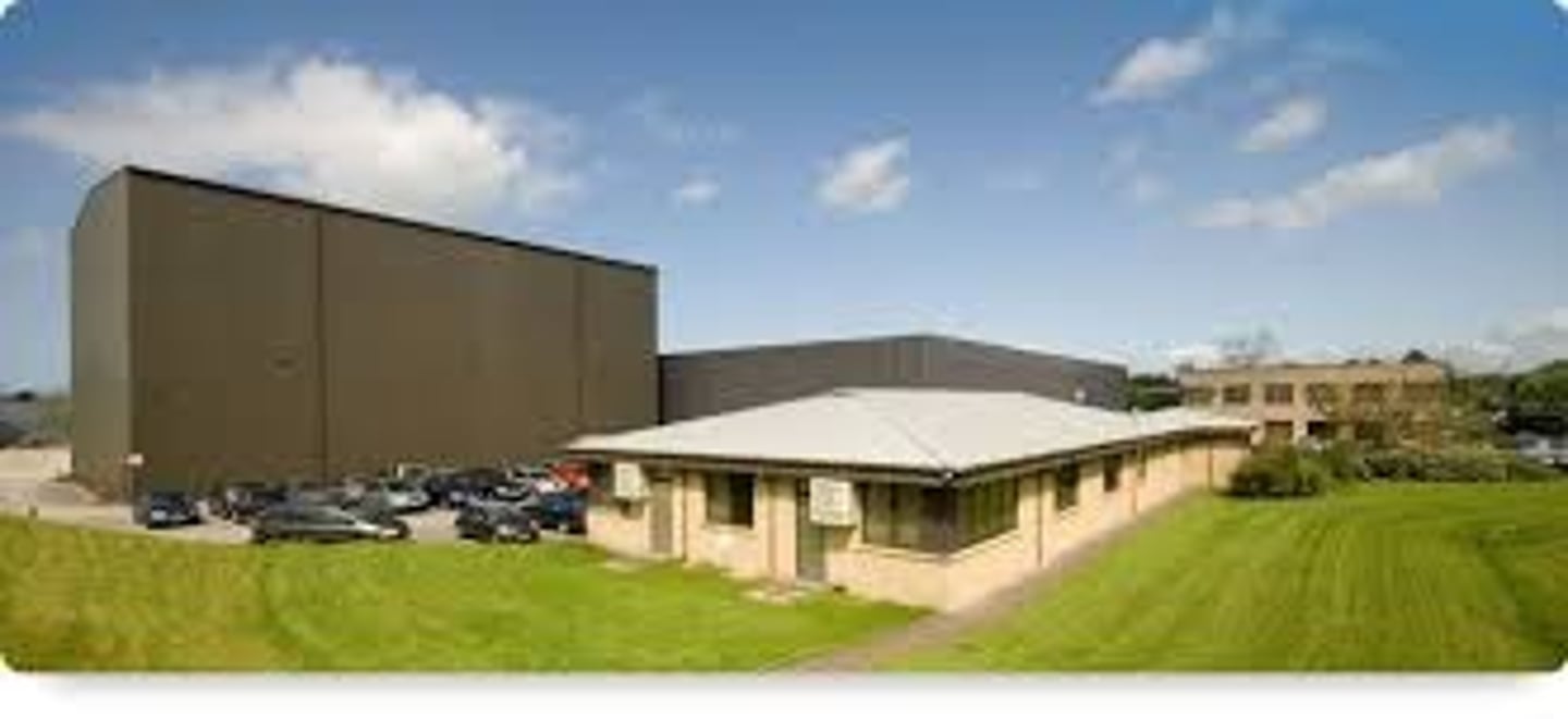 <p>приміщення, територія (the land and buildings owned by someone, especially by a company or organization: The company is relocating to new premises. There is no smoking allowed anywhere on school premises.)</p>