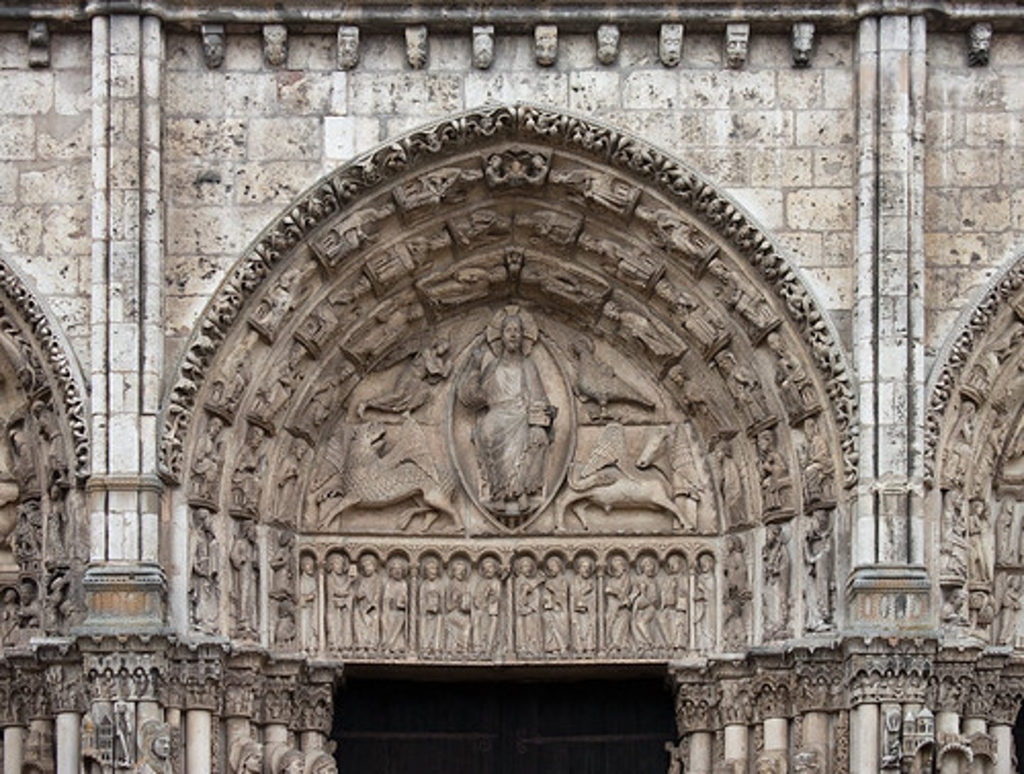 <p>The semicircular or triangular sculpted area above a doorway, enclosed by an arch and often filled with relief imagery.</p>
