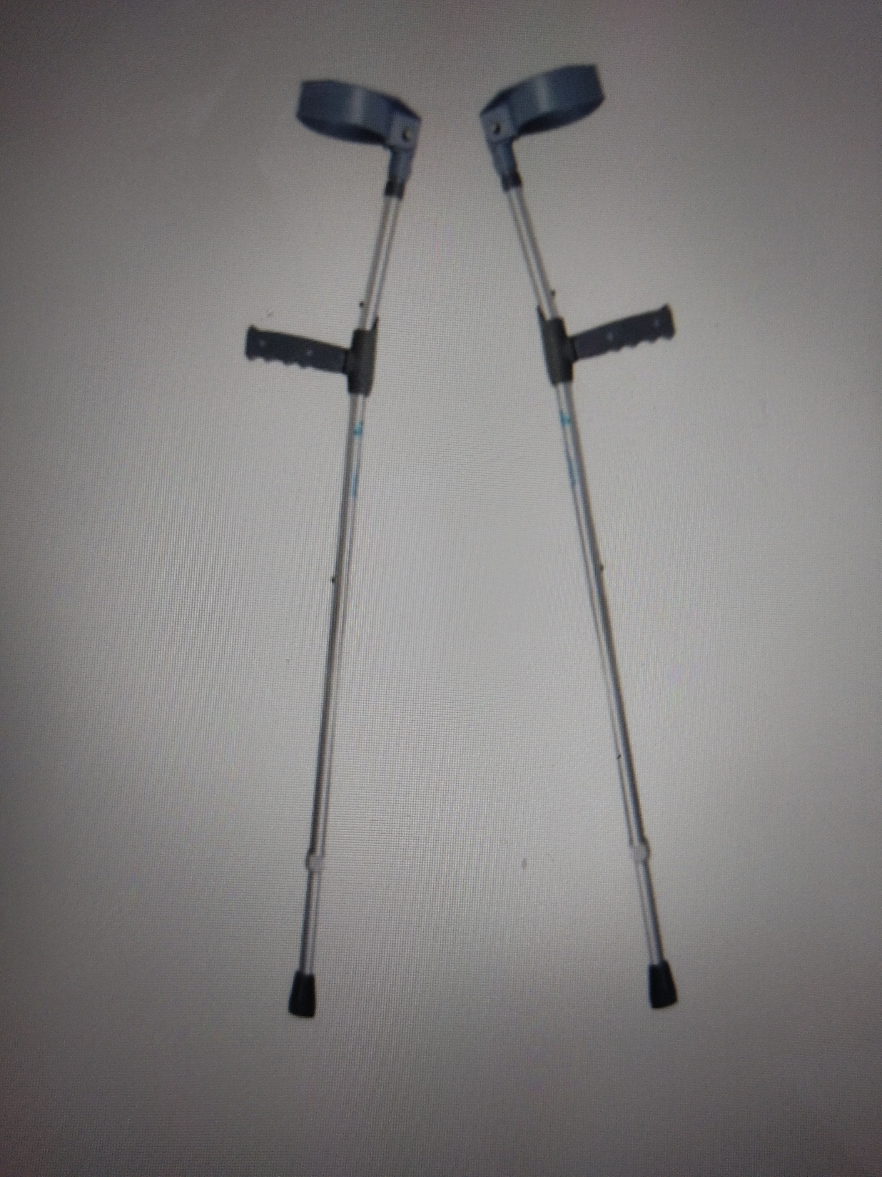 * It has molded handpiece, forearm piece, length adjustable that is tubular aluminum.