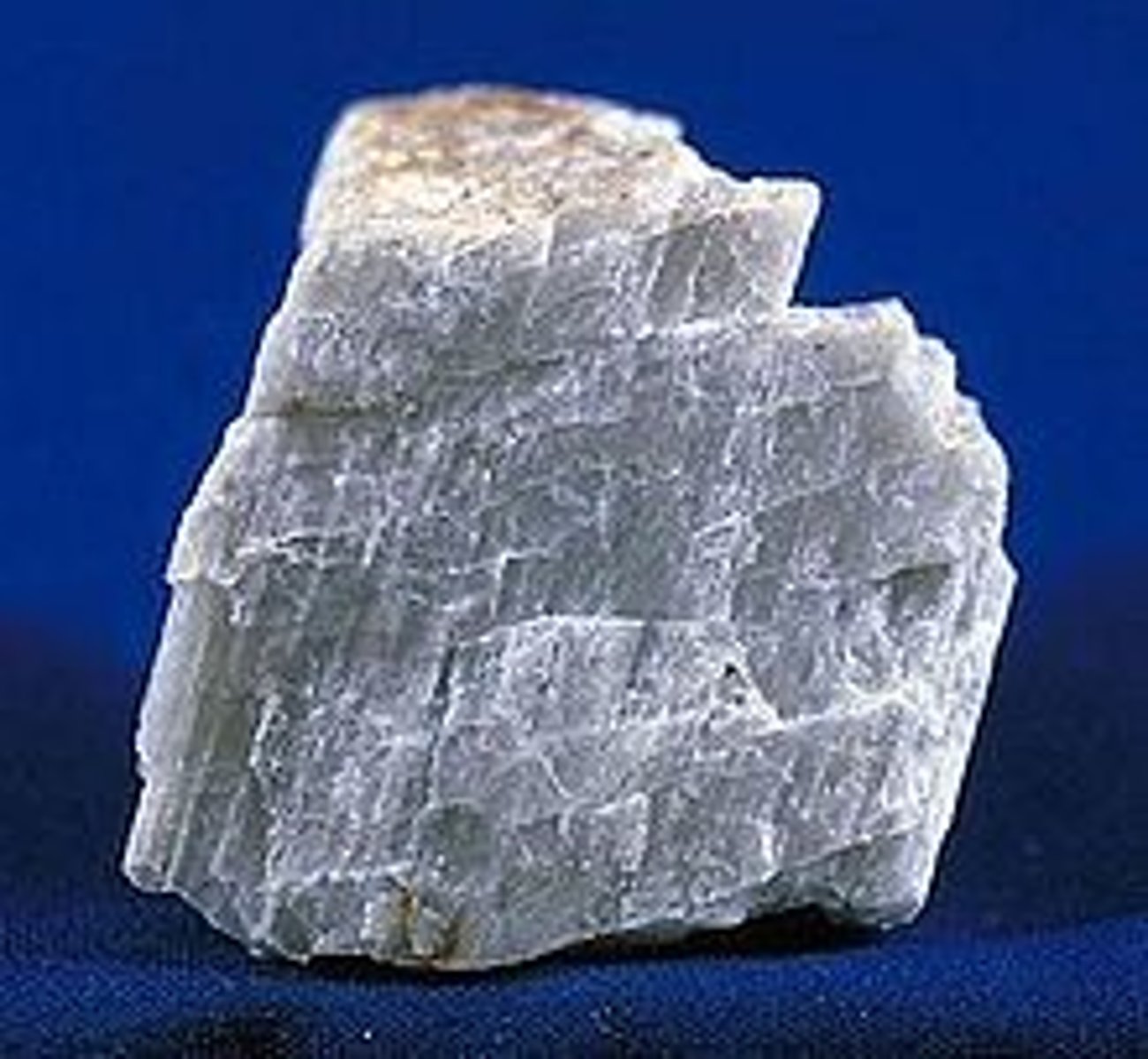 <p>Rock-forming mineral; hardness 6 (about as hard as glass), white to dark gray, 2 cleavages at nearly 90 degrees, parallel striations on some faces</p>