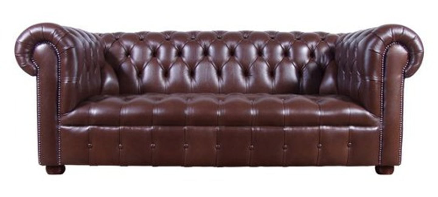 <p>Dating from the 18th century, a deep buttoned or tufted sofa with arms and back of the same height, usually made of leather. In the UK, this refers to any sofa with buttons, and quilting. Seat cushions are usually fixed.</p>