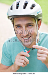 He wears a helmet.