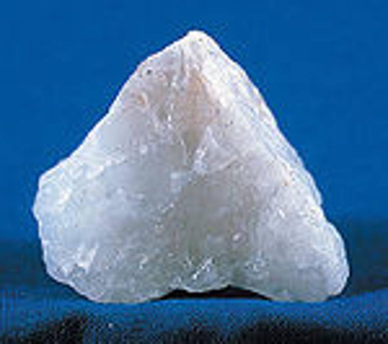 <p>Mineral</p><p>Color: white</p><p>Streak: colorless or light colored</p><p>Layers: none</p><p>Texture: smooth</p><p>Shiny:</p><p>Hardness: Moh's scale 7, Harder than glass, but softer than diamond or topaz</p><p>Other: the milky color is caused by impurities like moisture when the crystals form.</p>