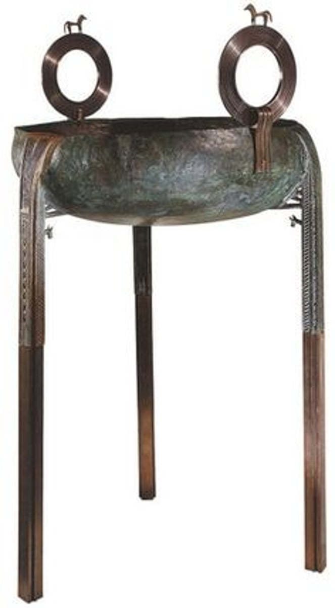 <p>Bronze objects from the Middle Geometric period (ca. 900-800 BCE) that served as votive offerings at sanctuaries, reflecting the rise of elite gift-giving and Eastern artistic influence.</p>