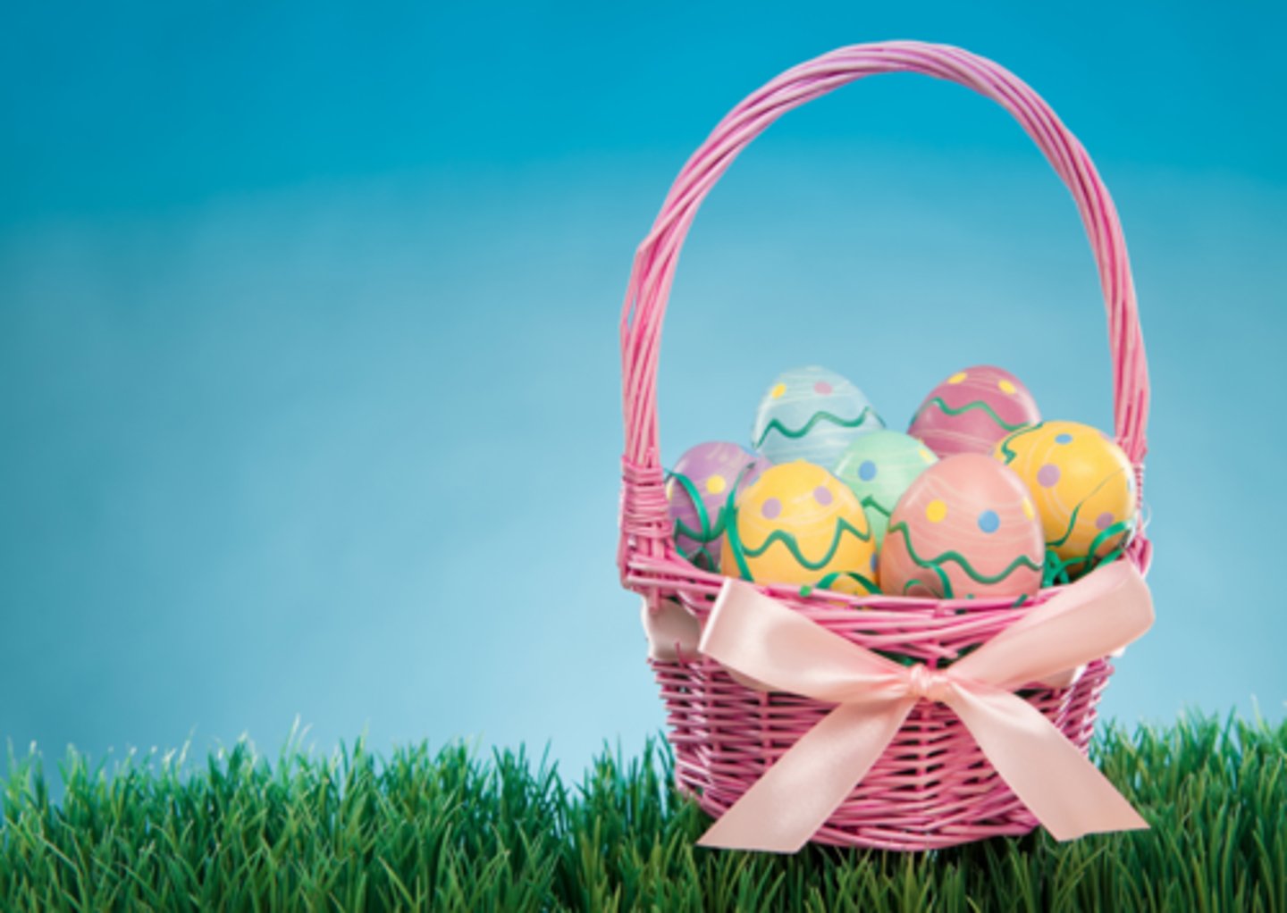 <p>add decorations to a basket for Easter, often filled with eggs or candy</p>