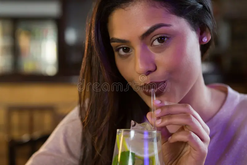 <p>The act of <strong>drinking slowly or in small amounts</strong>, often to enjoy the taste or temperature of a beverage.</p>