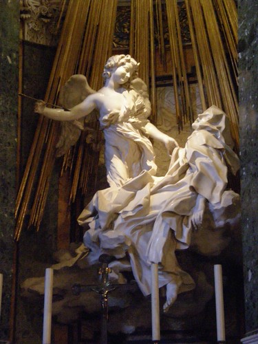 <p>Ecstasy of Saint Teresa</p><p>The traditional interpretation of ___________ Ecstasy of Saint Teresa is relatively straightforward. The sculpture portrays the Saint&apos;s overpowering sense of spiritual pleasure in serving Christ.________ employs imagery that suggests sensual pleasure, but only in order to convey the tangible nature of Teresa&apos;s experience - a manifestation of her love of God and her yearning for spiritual union with him. The work is consistent with the aims of the Catholic Counter-Reformation art campaign, which sought to convey the mysteries of Catholicism as cogently as possible.</p>