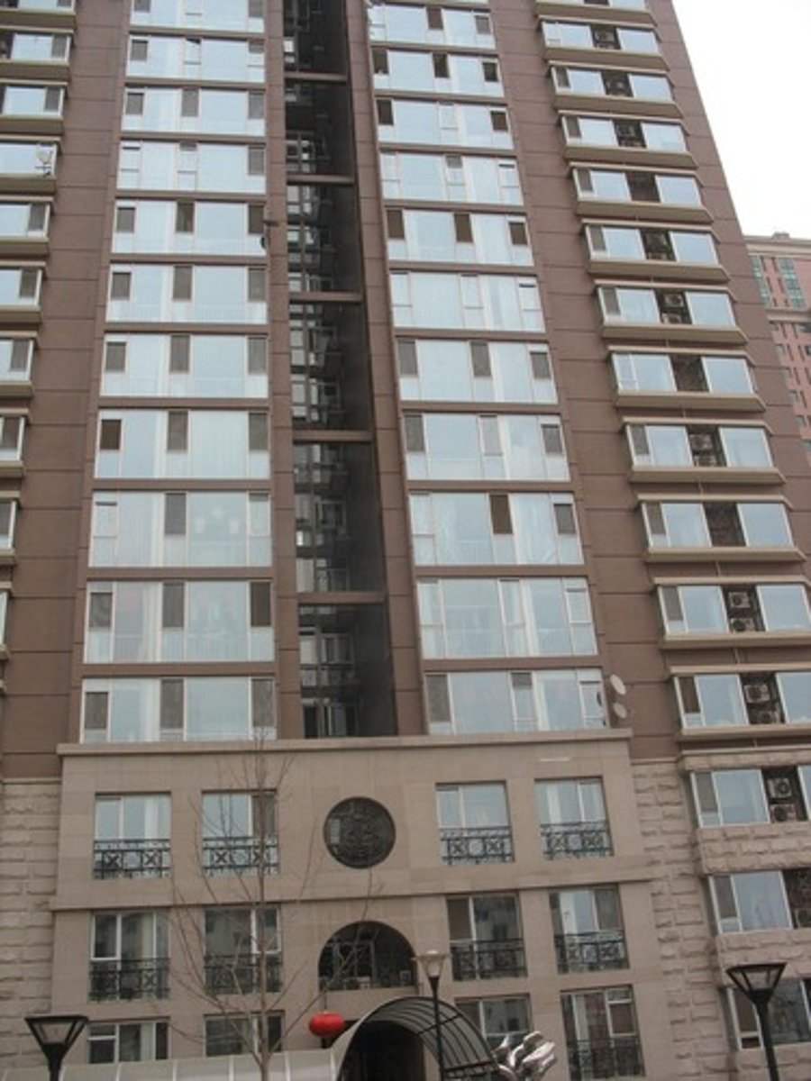 <p>the apartment building</p>