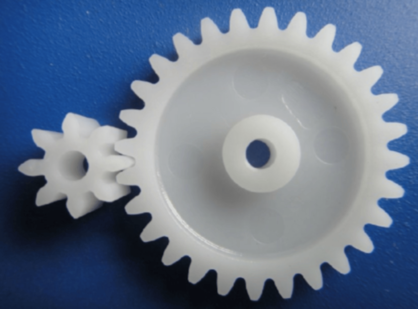 <p>A thermoplastic that is used in engineering to make gears and bearings. It's oily nature means that friction is reduced between moving parts.</p>