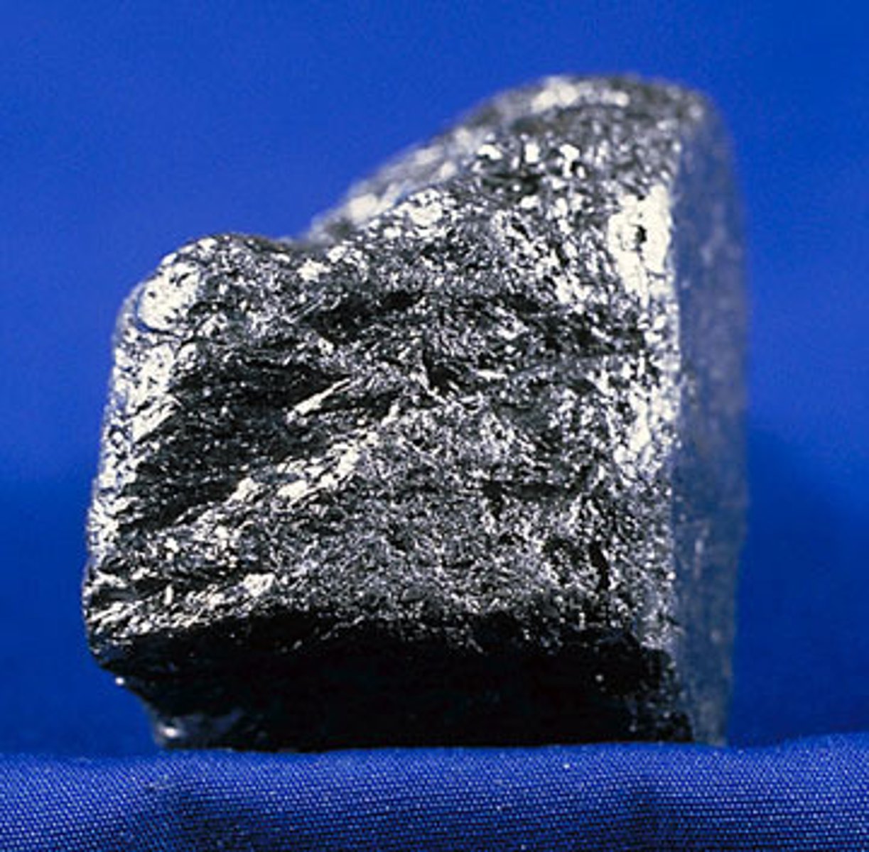 <p>A gray, crystalline, allotropic form of carbon that occurs as a mineral in some rocks and can be made from coke. It is used as a solid lubricant, in pencils, and as a moderator in nuclear reactors</p>