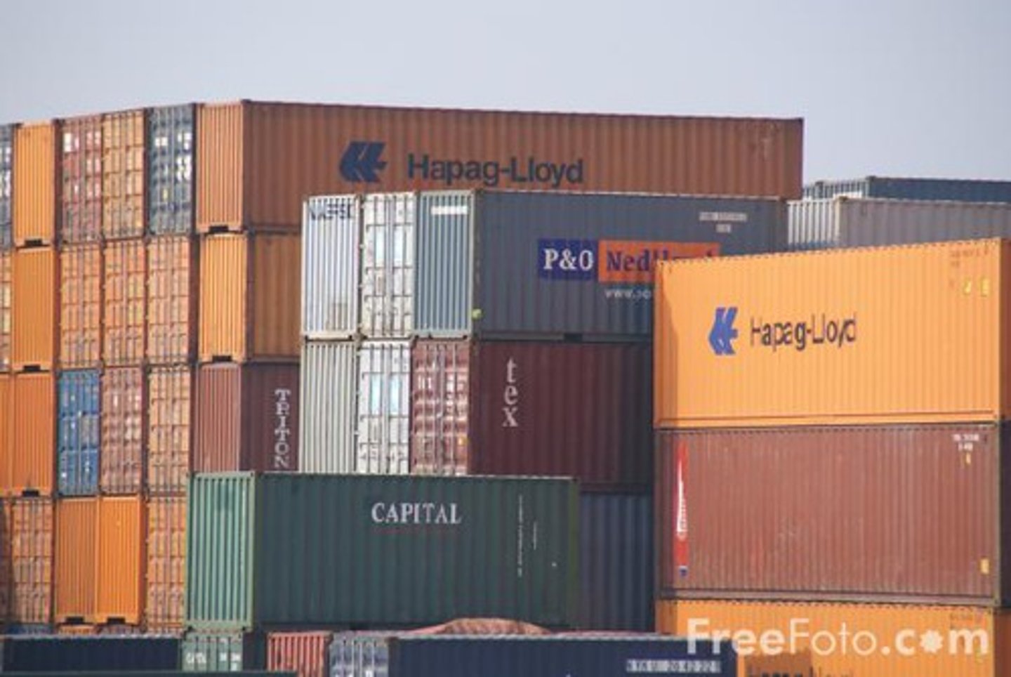 <p>standardized metal boxes that can be stacked uniformly for shipping non-bulk cargo like food, clothing, and in some cases, raw materials.</p>