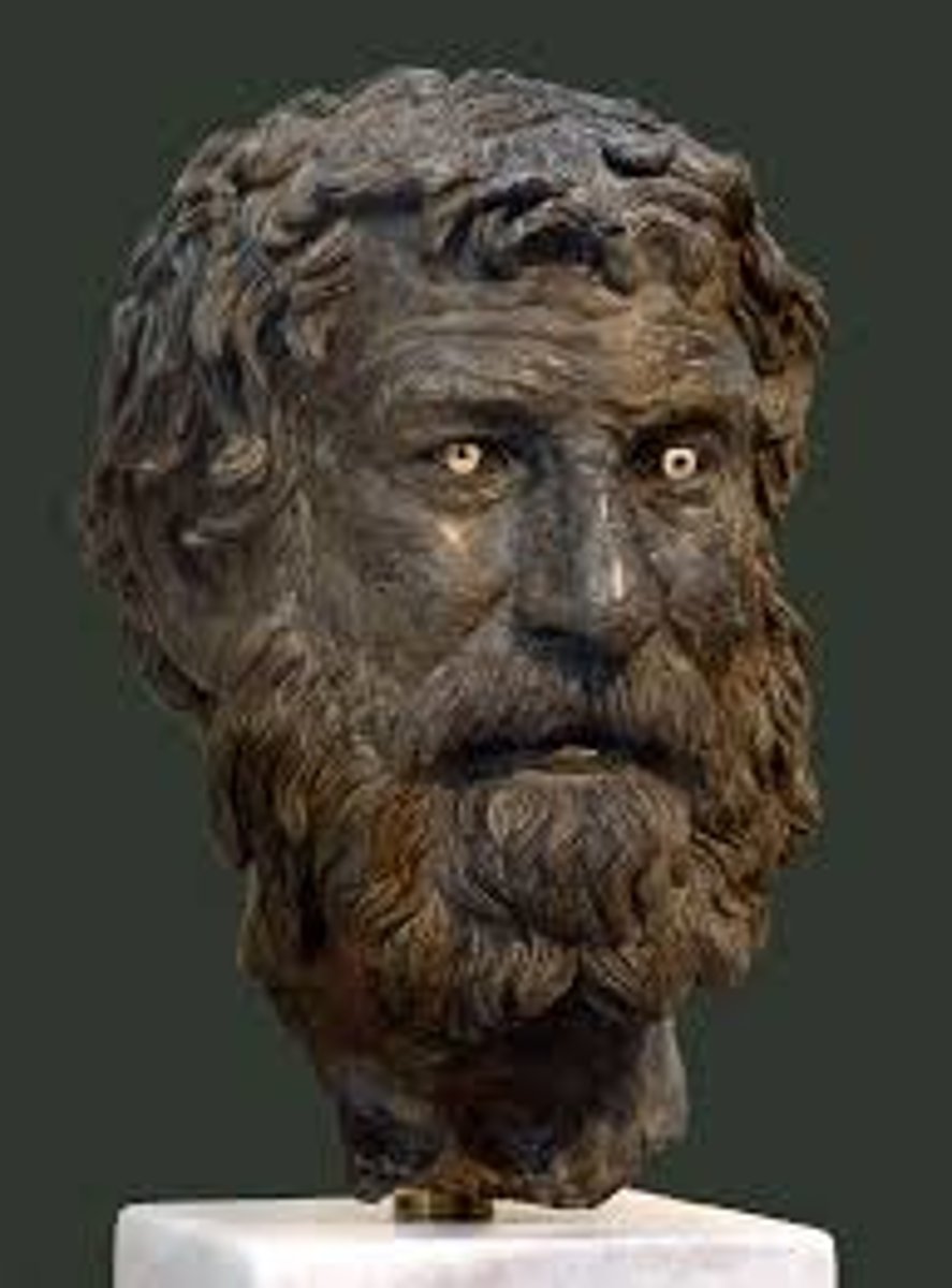 <p>found in Antikythera shipwreck. Athens, National Archaeological Museum. ca. 3rd century BCE. bronze statue with the original, creepy eyes</p>