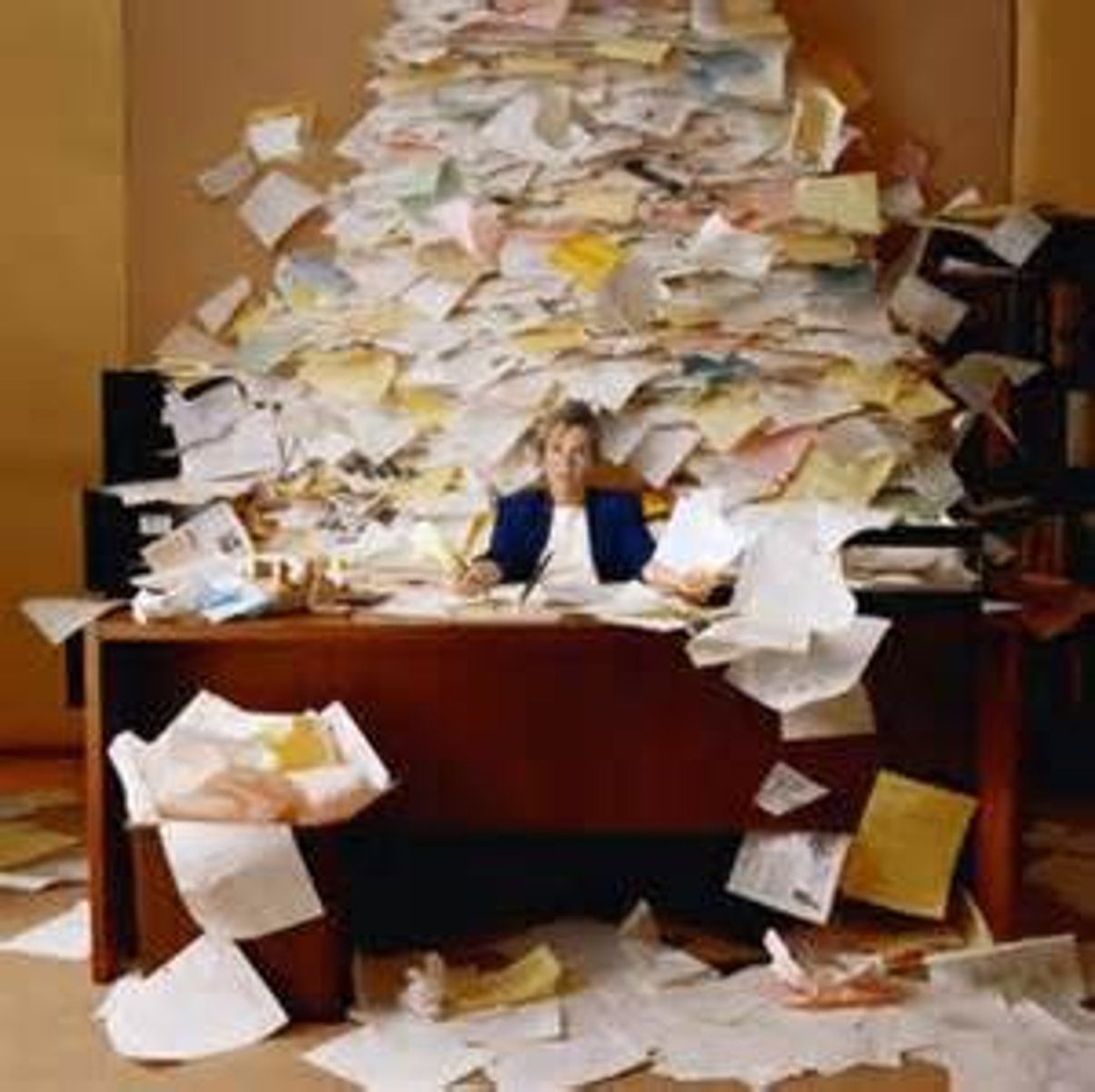 <p><strong>a large number of things that you should have done before and must do now:</strong></p><p><em>I've got a huge ... of work to do.</em></p>
