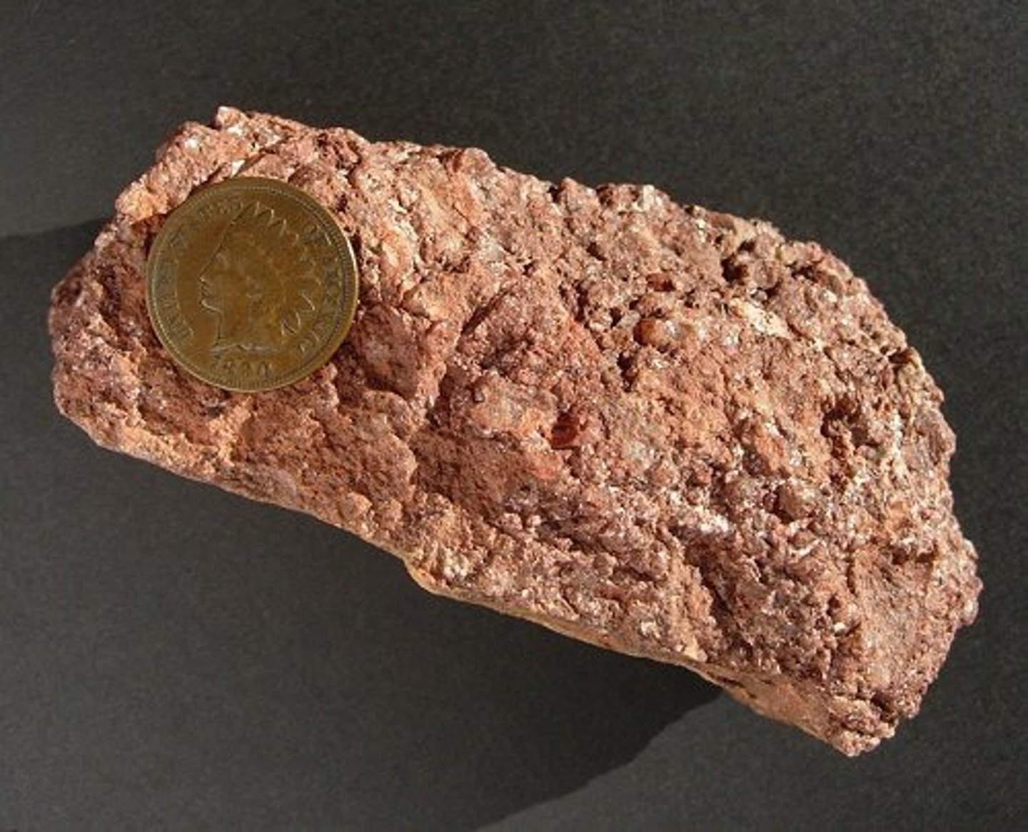 <p>-Very coarse sandstone, mostly quartz and feldspar, -usually pink or gray.</p>
