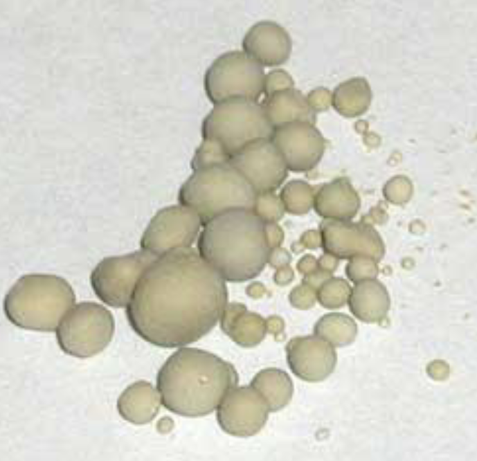 <p>What is the crystal that formed on the exterior of these stones?</p><p>What is the nucleus made of?</p><p>What is the stones coating made of?</p><p>Briefly explain how this may have been formed?</p>