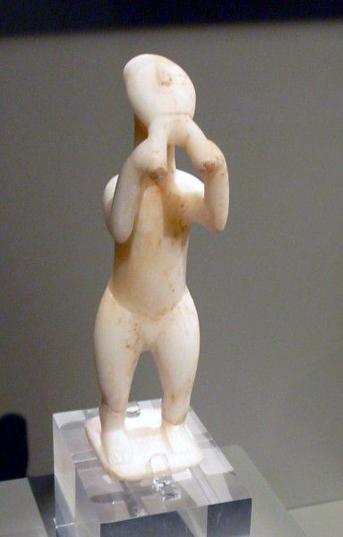 <p><span style="font-family: sans-serif"><mark data-color="green">statuette of man playing double flute/aulos</mark></span></p>