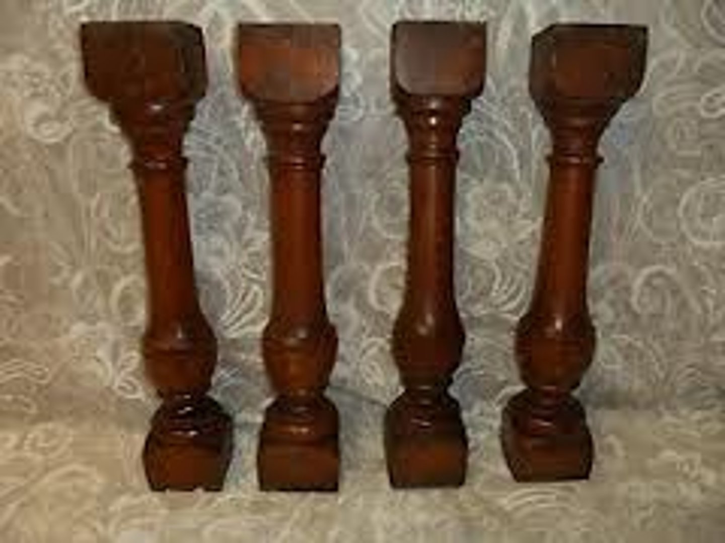 <p>Small, heavily proportioned pillar used for vertical support in a railing, typically made of wood or stone i.e Venetian balcony. A column form of turned wood, twisted or tapered form or vase-shaped columns</p>