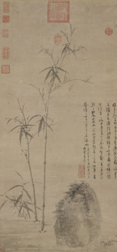 <p>significance of stalks of bamboo by a rock</p>