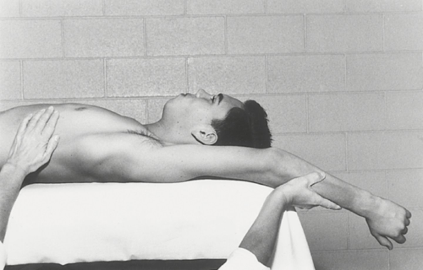 <p>Supine, knees flexed, elbow extended with palm facing body</p>