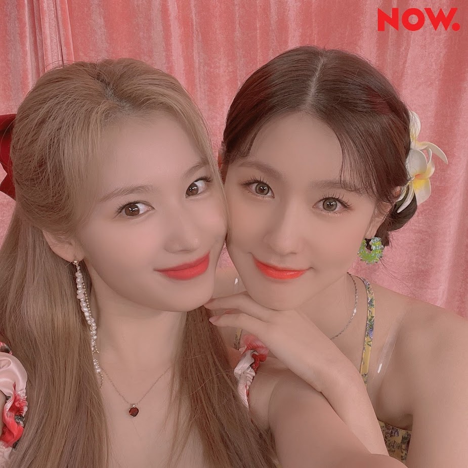 <p>miyeon + sana. which is which</p>