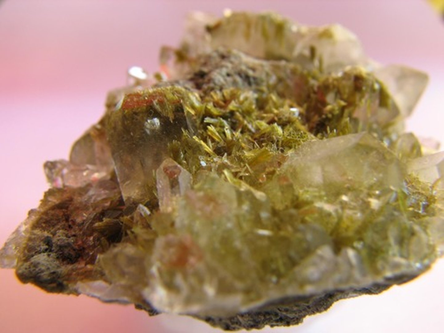 <p>Greenish-yellow and grainy.</p>