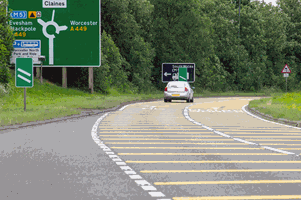 <p>why are these yellow lines painted across the road?</p>