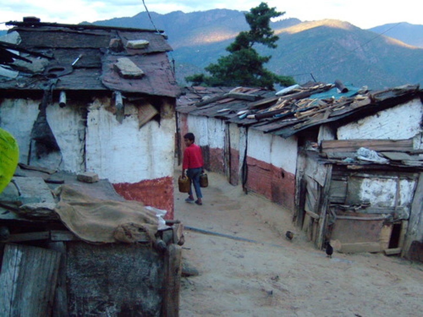 <p>Areas of poverty in which the people do not own the land, little planning, no public services or infrastructure</p>