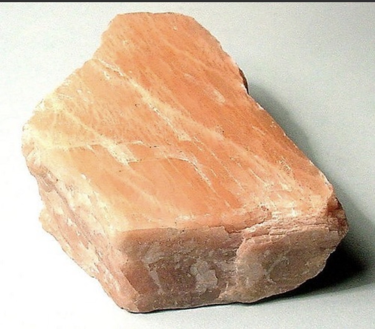 <p>Feldspar, white streak, good cleavage/fraction in two directions at ~90°, vitreous luster, flesh pink/gray colors. It’s a micro-cline if deep green color. Very common in soils and acidic igneous rock. Mostly sand and silt sized in soils. Important potassium (K) source for plants.</p>