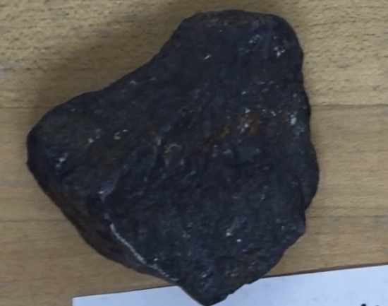 <p>Magnetic, dark grey, scratches glass</p>