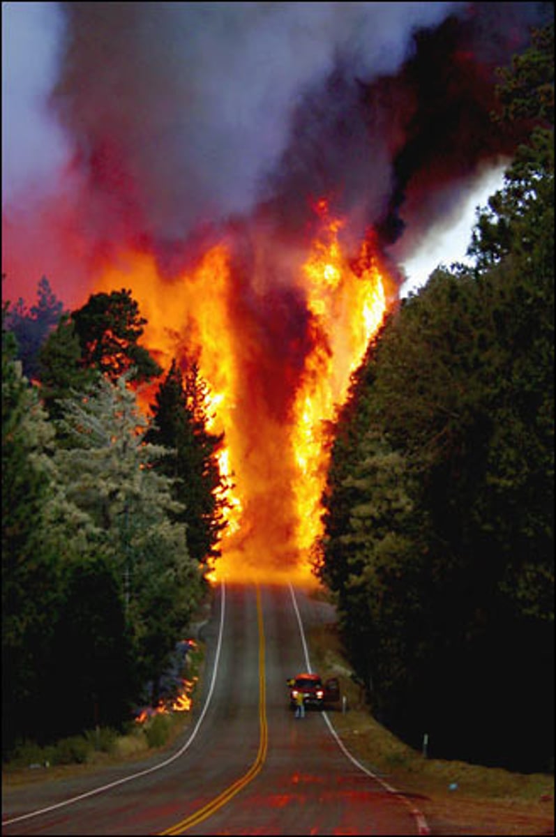 <p>(n) a fire; especially a large disastrous fire</p>