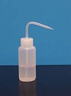 A plastic squeezable bottle with a long thin spout