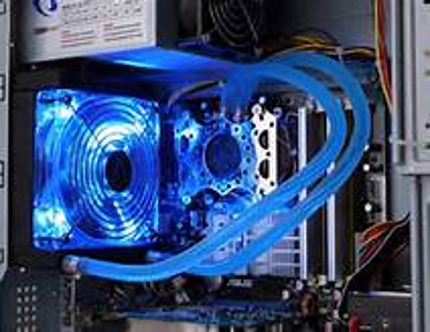 <p>A method of cooling a PC that works by running some liquid—</p><p>usually water—through a metal block that sits on top of the CPU, absorbing heat. The</p><p>liquid gets heated by the block, runs out of the block and into something that cools the</p><p>liquid, and is then pumped through the block again.</p>