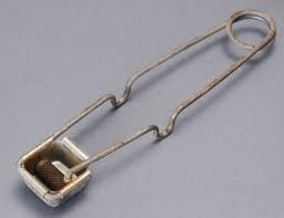<p><span>Made of metal and has a flint; used to ignite the Bunsen burner</span></p>