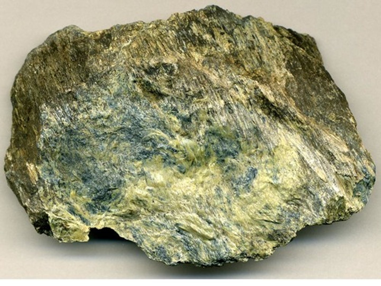 <p>Blue-green rock. No minerals or sediments visible. Slippery to touch. Formed from metamorphosed mantle material.</p>