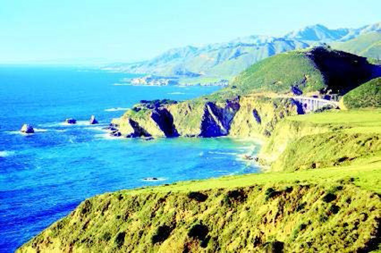 <p>coastline where sea level is dropping or the land is rising</p>