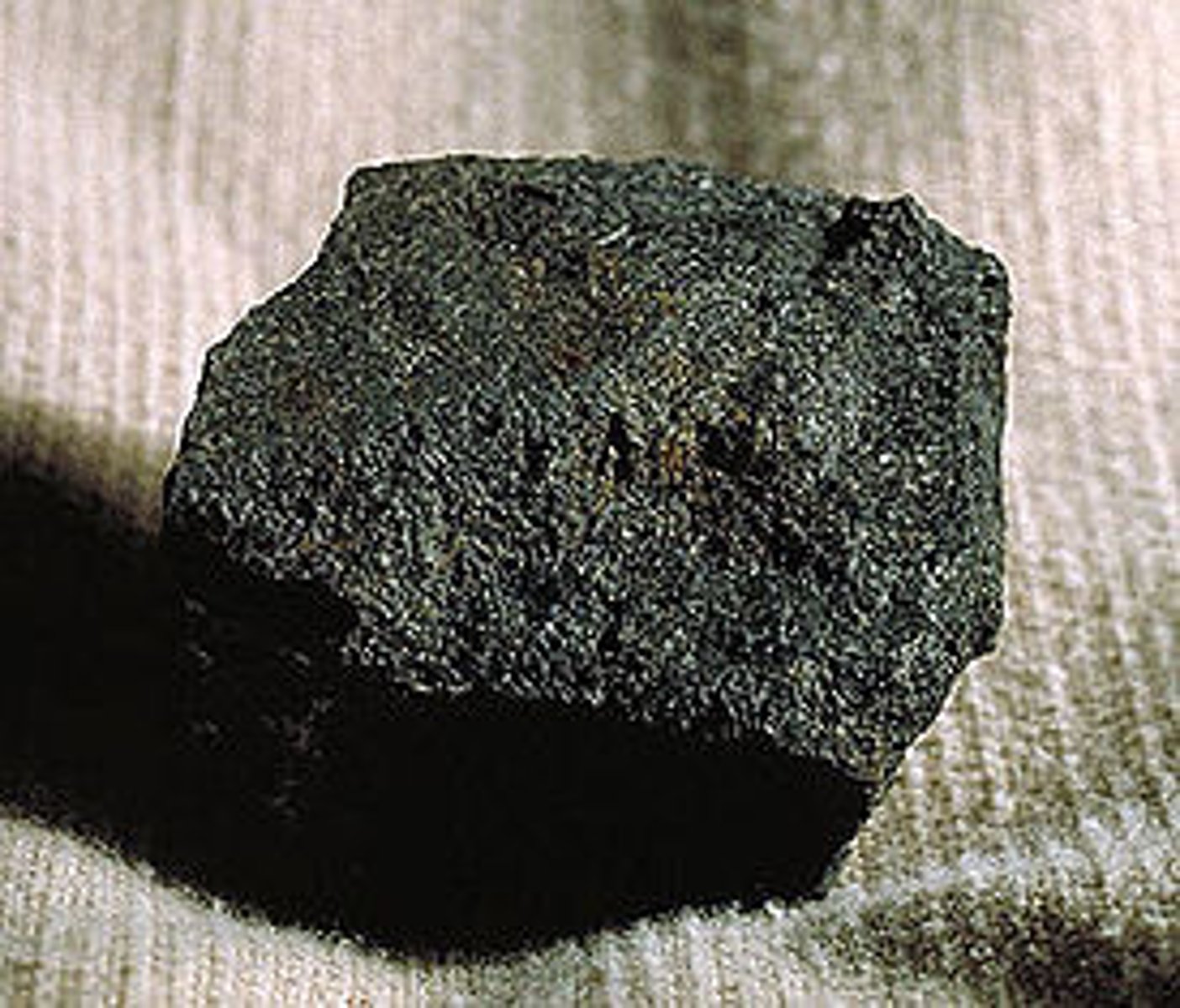 <p>sedimentary rock, plant fragments or charcoal, black in color, very light, burns</p>