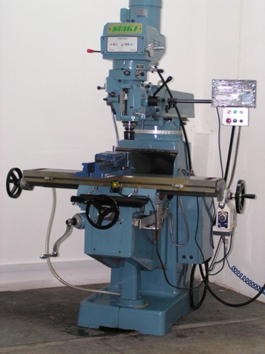 <p>Using a machine that looks similar to a drill. The work to be machined is clamped onto the table of the machine. The table can run from left to right , forwards and backwards and up and down therefore the workpiece can be machined in a range of directions.</p>