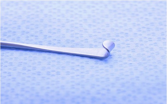 <p>retract nerve root, nerve root is larger so requires a wider instrument than the nerve hook </p>