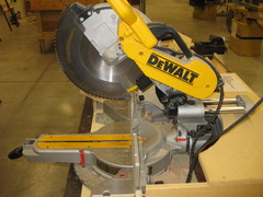<p>A powered circular saw mounted on guides with a fence to ensure accurate cuts at any angle. NOT portable.</p>