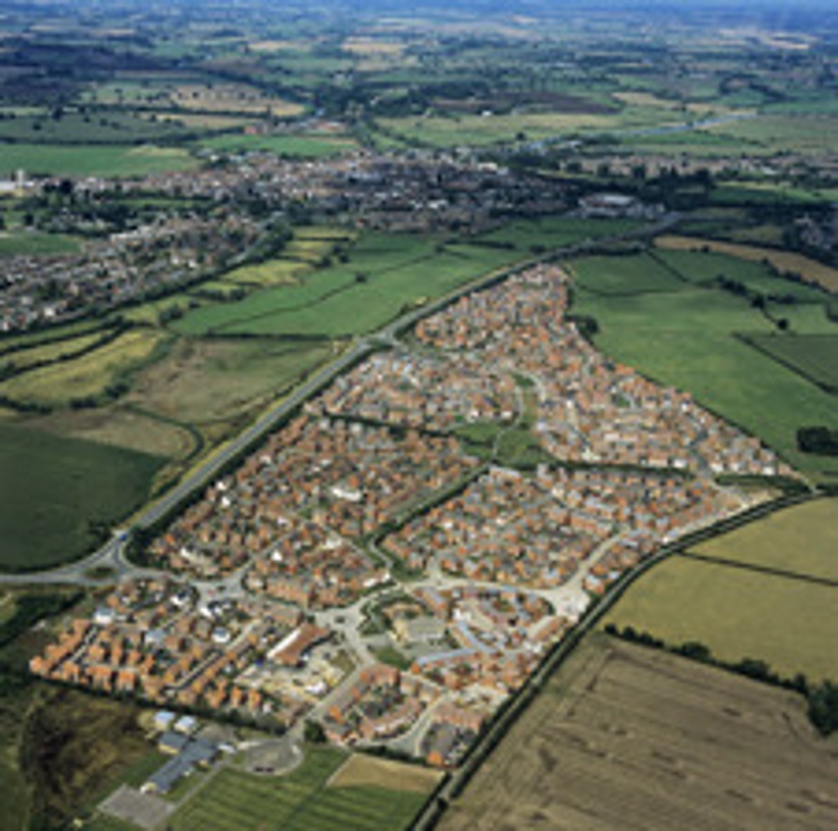 <p>A plot of natural land, often in a rural or on the fringe of an urban area</p><p>that has not yet been subject to any building development.</p>