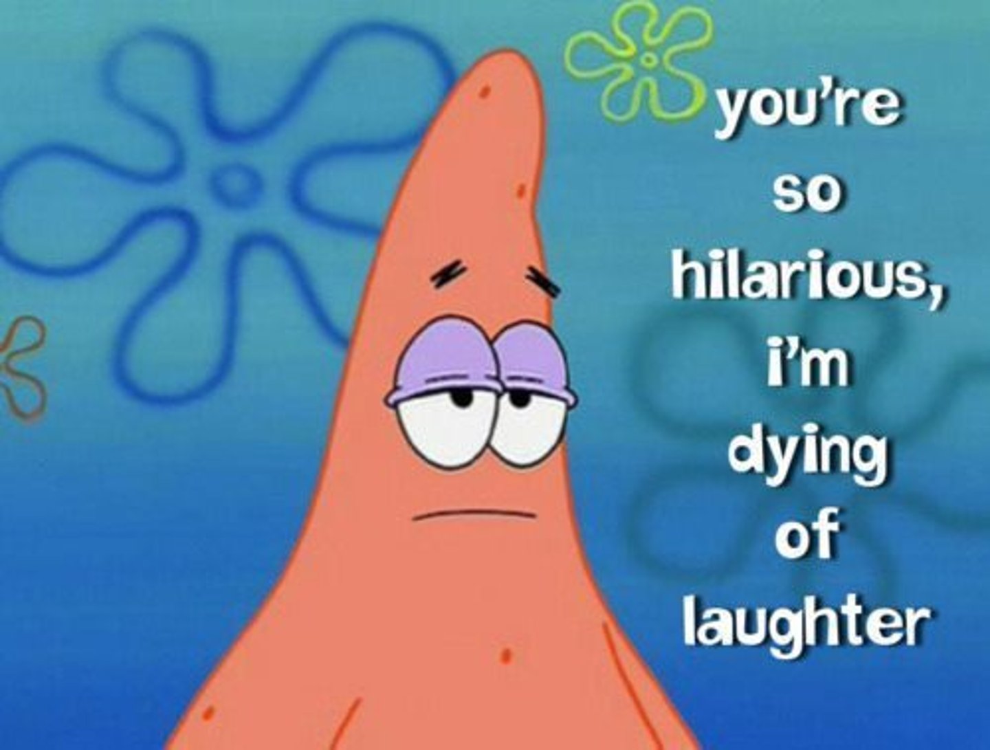 <p>in a dry or sarcastic manner; usually mocking</p>