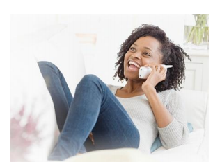 <p>be conducting a phone conversation</p>