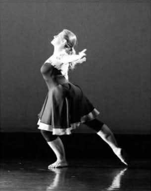 <p><span>An action that tilts the breastbone up rather than ending with the spine and upper body in an upright neutral position. The shoulder blades appear to rest on a bar or shelf. The head remains aligned with the spine and the rib cage remains over the hips. The lower back is not bent.</span></p>