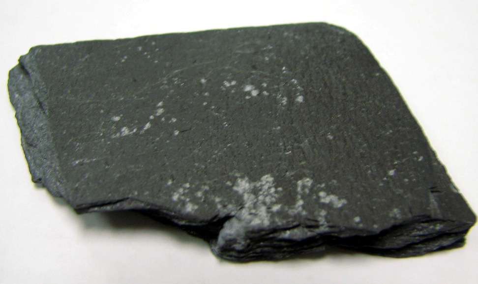 <p>Slaty cleavage, breaks into thin sheets, smooth, metamorphic</p>