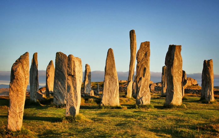 <p>It is a megalithic site of standing stones arranged in cruciform pattern with a stone circle in its center.</p>